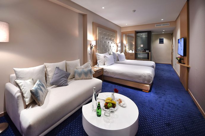 Imagen de la habitación del Hotel Flower Town and Spa. Foto 11