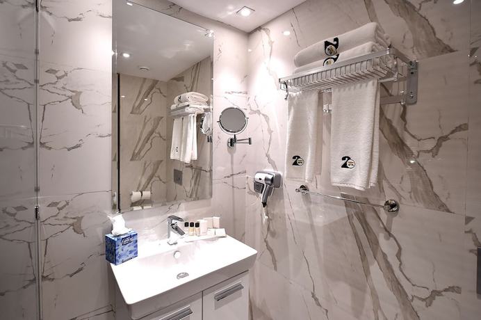 Imagen de la habitación del Hotel Flower Town and Spa. Foto 12