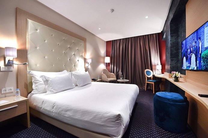 Imagen de la habitación del Hotel Flower Town and Spa. Foto 16