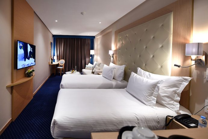 Imagen de la habitación del Hotel Flower Town and Spa. Foto 17