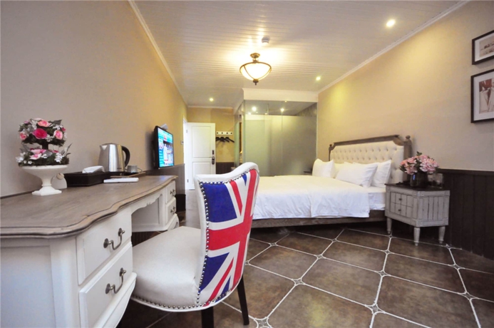 Imagen de la habitación del Hotel Flower Yard Inn Xiamen Gulangyu Anhai Garden Branc. Foto 7