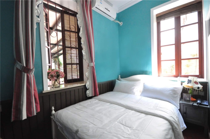 Imagen de la habitación del Hotel Flower Yard Inn Xiamen Gulangyu Anhai Garden Branc. Foto 13