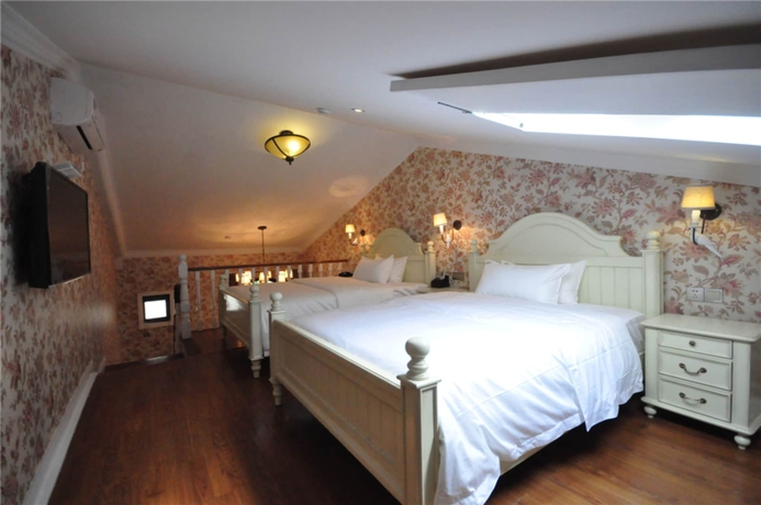 Imagen de la habitación del Hotel Flower Yard Inn Xiamen Gulangyu Anhai Garden Branc. Foto 14