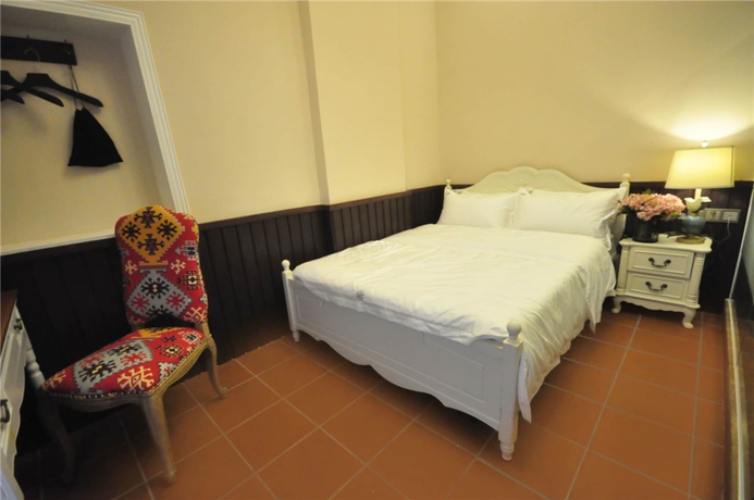Imagen de la habitación del Hotel Flower Yard Inn Xiamen Gulangyu Anhai Garden Branc. Foto 15