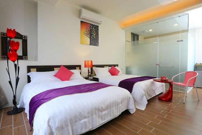 Imagen de la habitación del Hotel Flowerforest. Foto 2