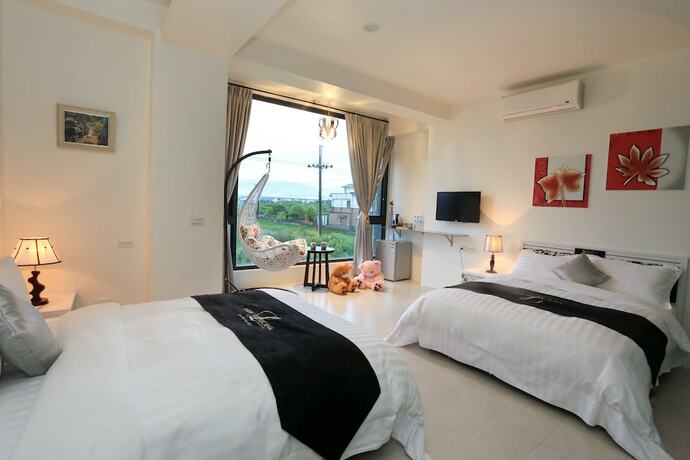 Imagen de la habitación del Hotel Flowerforest. Foto 3