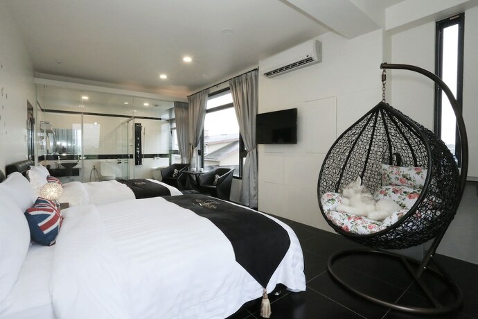 Imagen de la habitación del Hotel Flowerforest. Foto 7