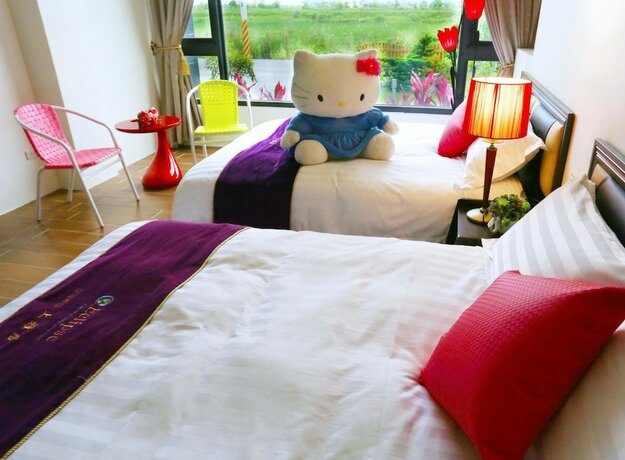 Imagen de la habitación del Hotel Flowerforest. Foto 9