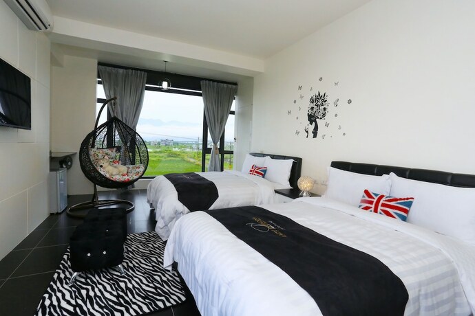 Imagen de la habitación del Hotel Flowerforest. Foto 11