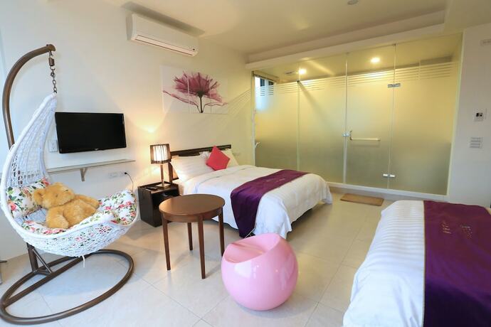 Imagen de la habitación del Hotel Flowerforest. Foto 12