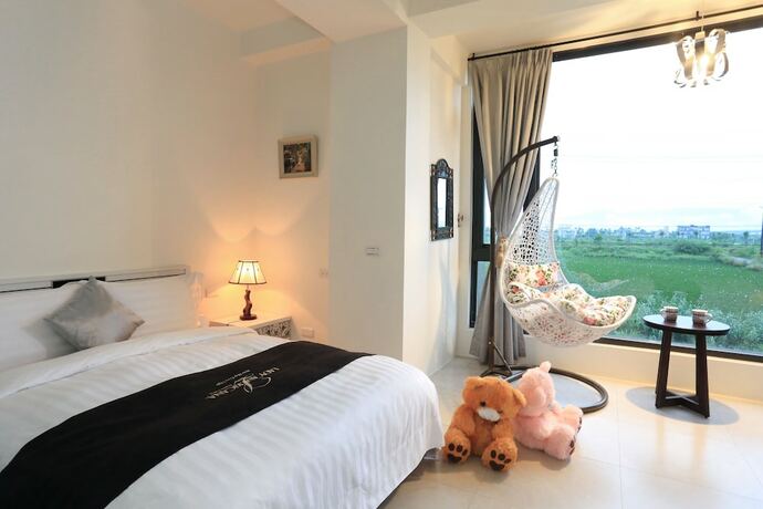 Imagen de la habitación del Hotel Flowerforest. Foto 13