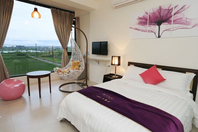 Imagen de la habitación del Hotel Flowerforest. Foto 14