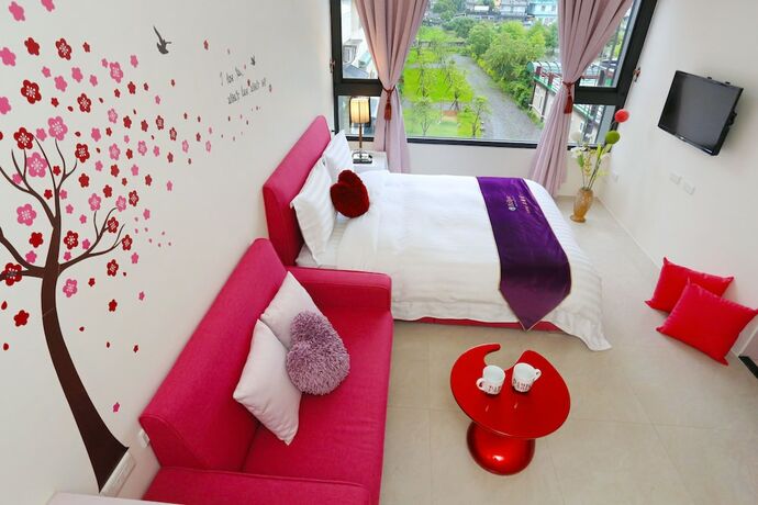 Imagen de la habitación del Hotel Flowerforest. Foto 15