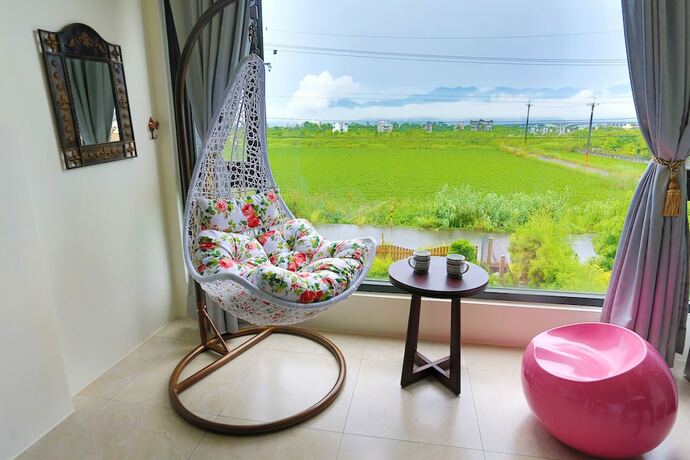 Imagen de la habitación del Hotel Flowerforest. Foto 17