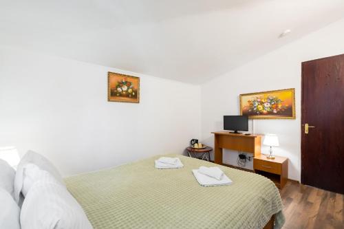 Imagen de la habitación del Hotel Flowers Grand Hotel Bucharest. Foto 14