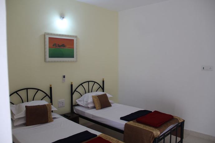 Imagen de la habitación del Hotel Flowers Guest House. Foto 4