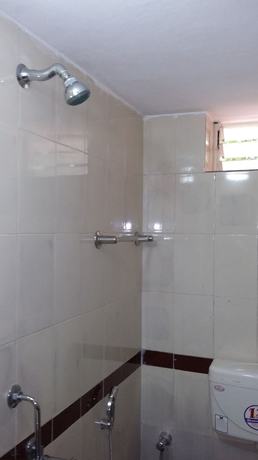 Imagen de la habitación del Hotel Flowers Guest House. Foto 5