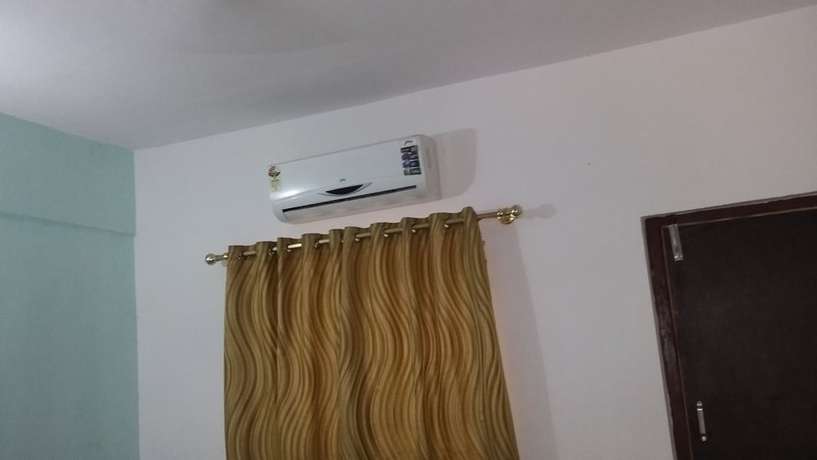 Imagen de la habitación del Hotel Flowers Guest House. Foto 7