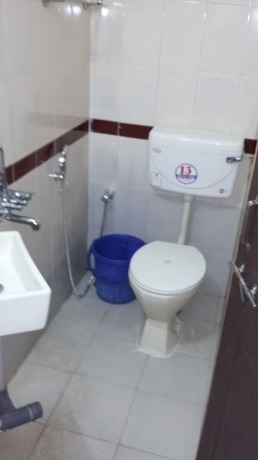 Imagen de la habitación del Hotel Flowers Guest House. Foto 8