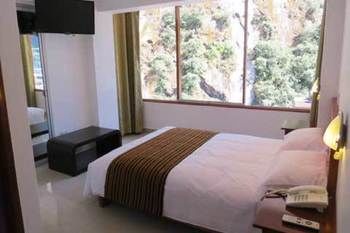 Imagen de la habitación del Hotel Flower's House Machupicchu. Foto 10
