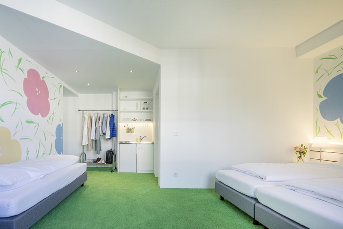 Imagen de la habitación del Hotel Flowers Münster. Foto 12