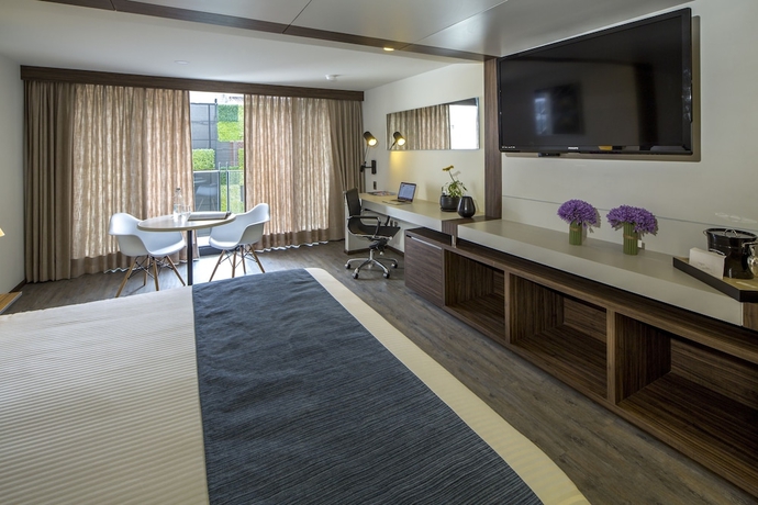 Imagen de la habitación del Hotel Flowsuites Condesa Adults Only. Foto 10