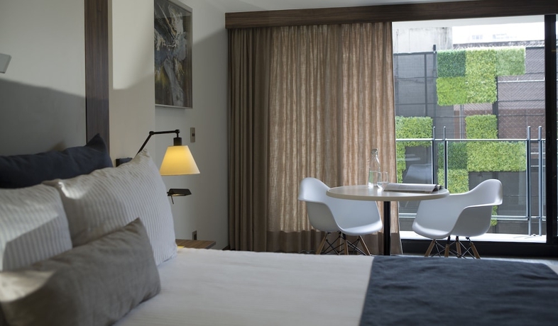 Imagen de la habitación del Hotel Flowsuites Condesa Adults Only. Foto 11