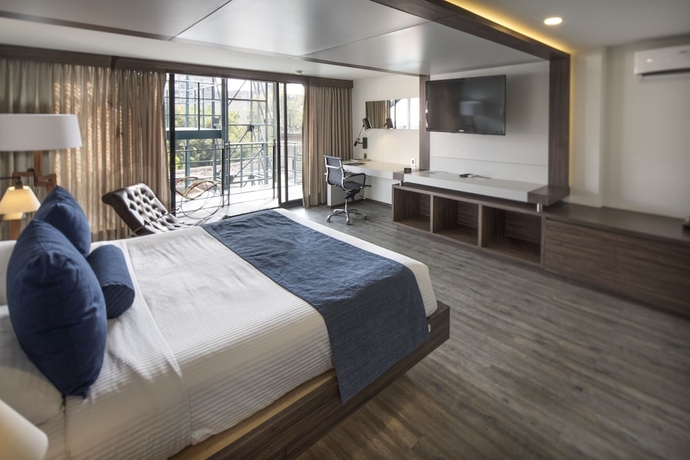 Imagen de la habitación del Hotel Flowsuites Condesa Adults Only. Foto 14