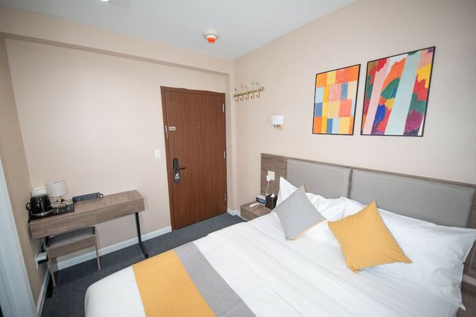 Imagen de la habitación del Hotel Flushing Garden. Foto 19