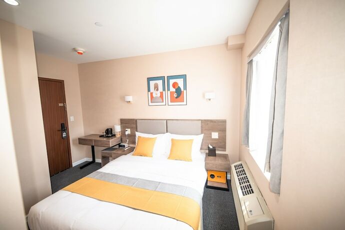 Imagen de la habitación del Hotel Flushing Garden. Foto 20