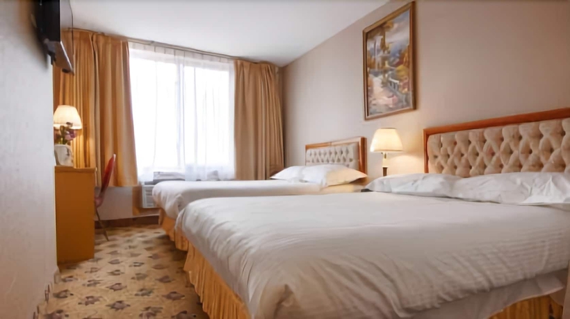 Imagen de la habitación del Hotel Flushing Hotel. Foto 4