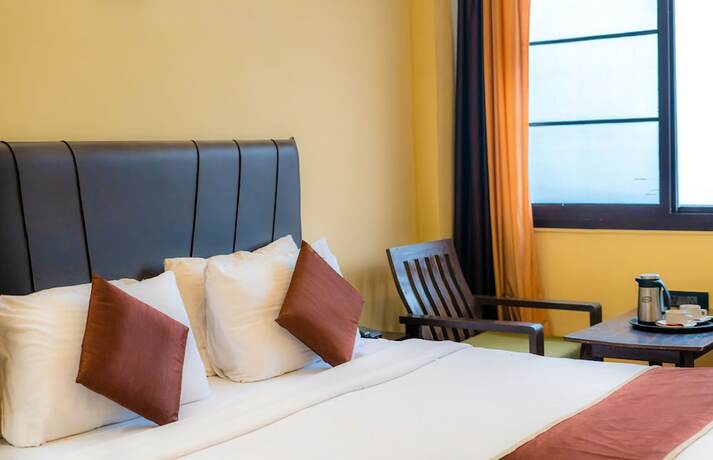 Imagen de la habitación del Hotel Flutters and Resort. Foto 12