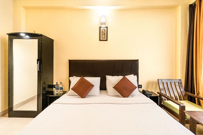 Imagen de la habitación del Hotel Flutters and Resort. Foto 14