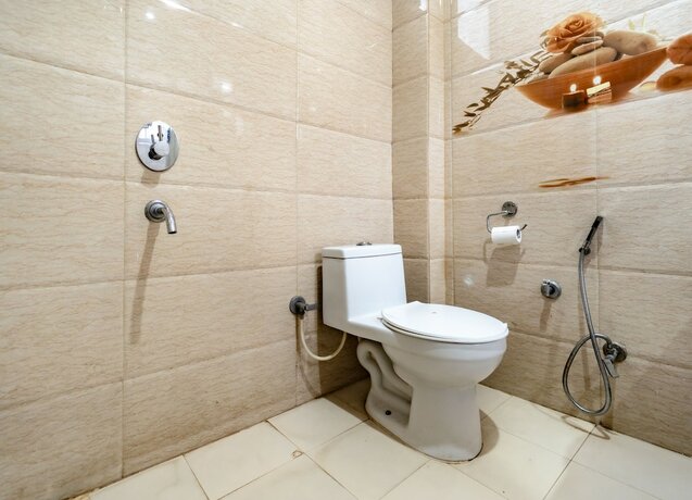 Imagen de la habitación del Hotel Flutters and Resort. Foto 16