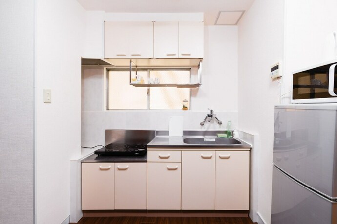 Imagen de la habitación del Hotel F-minami. Foto 23