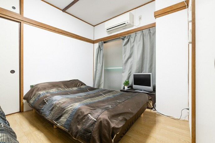 Imagen de la habitación del Hotel F-minami. Foto 25