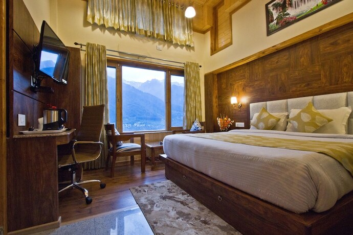 Imagen de la habitación del Hotel Foghills Cottages Manali. Foto 15