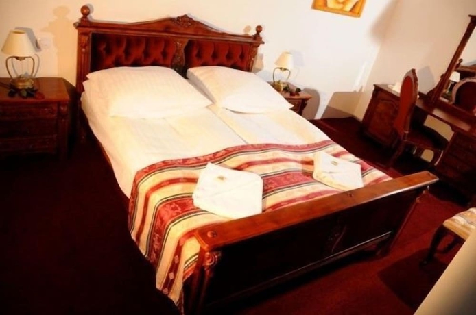 Imagen de la habitación del Hotel Folwark Stara Winiarnia. Foto 7