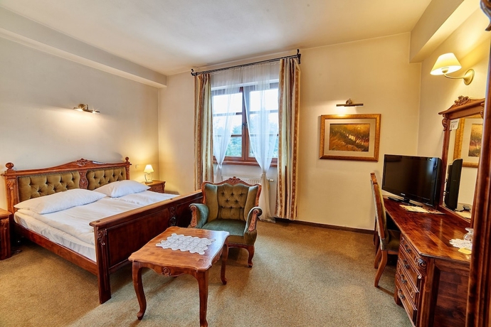 Imagen de la habitación del Hotel Folwark Stara Winiarnia. Foto 9