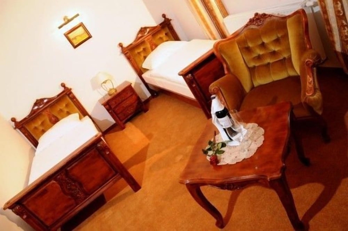 Imagen de la habitación del Hotel Folwark Stara Winiarnia. Foto 12