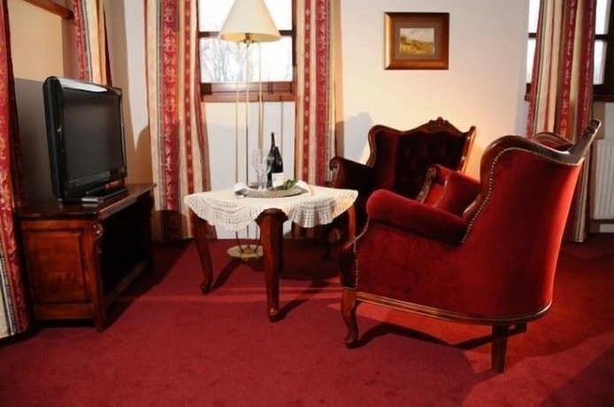 Imagen de la habitación del Hotel Folwark Stara Winiarnia. Foto 15