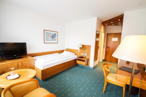 Imagen de la habitación del Hotel Fontana, Bad Kissingen. Foto 7