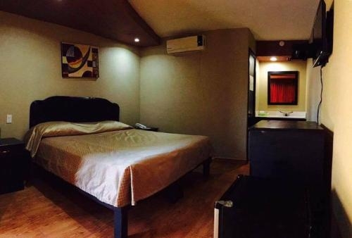 Imagen de la habitación del Hotel Fontana Inn. Foto 5