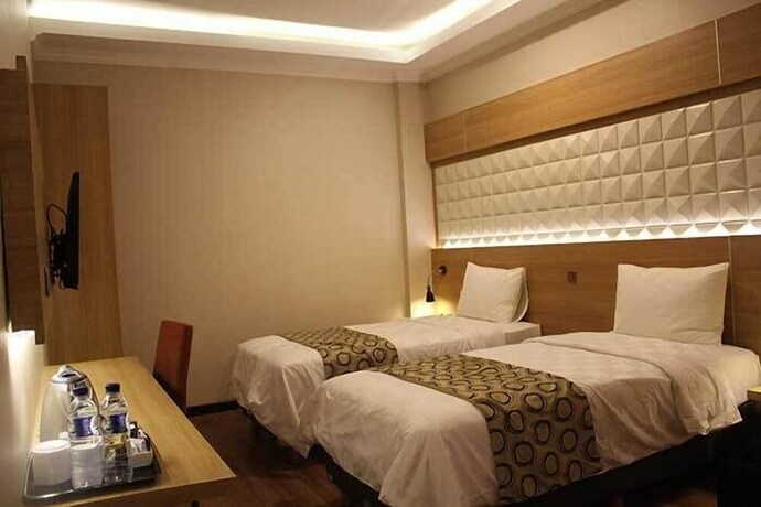 Imagen de la habitación del Hotel Fontana Jakarta. Foto 26