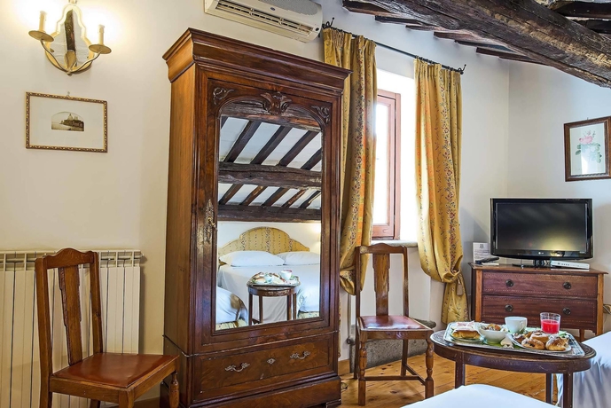 Imagen de la habitación del Hotel Fontana, Roma. Foto 12