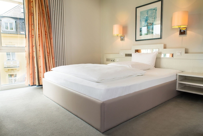 Imagen de la habitación del Hotel Fontana Wiesbaden. Foto 10