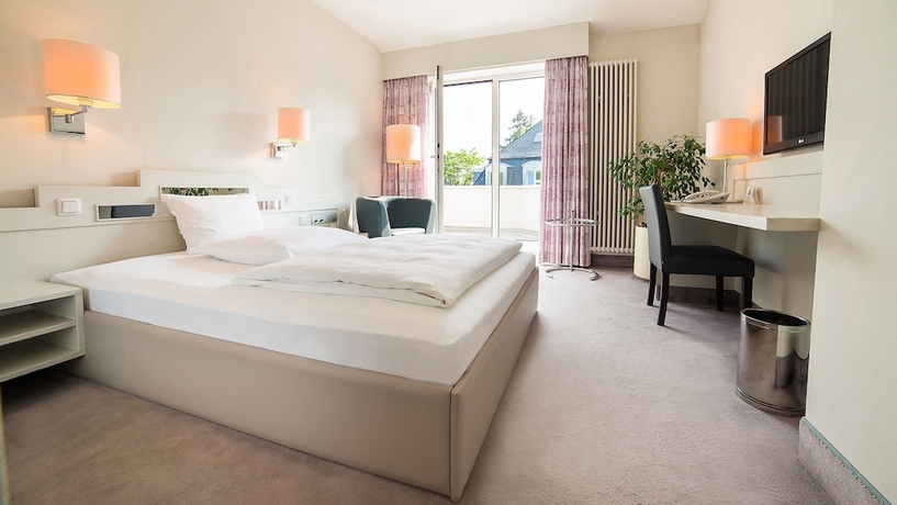 Imagen de la habitación del Hotel Fontana Wiesbaden. Foto 11