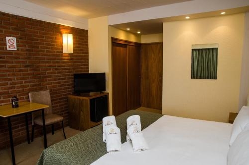 Imagen de la habitación del Hotel Fonte Arcada, Villa Gesell. Foto 10