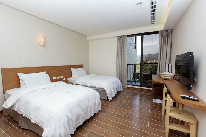 Imagen de la habitación del Hotel Footprint Inn. Foto 17