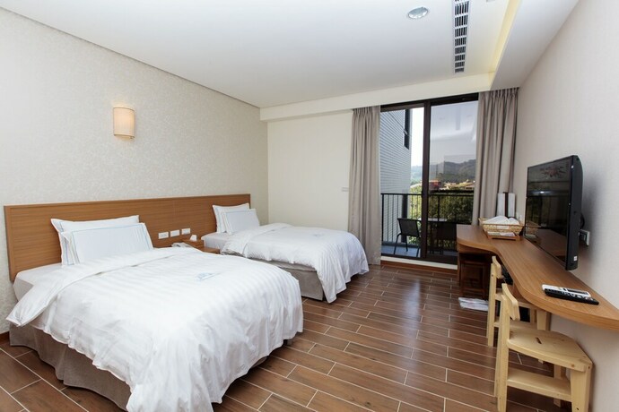 Imagen de la habitación del Hotel Footprint Inn. Foto 36